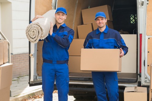 Organized mobile storage unit with labeled boxes and furniture