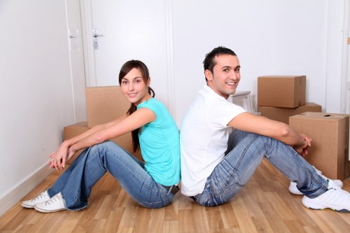 Organized moving boxes and packing supplies for a Belmont relocation