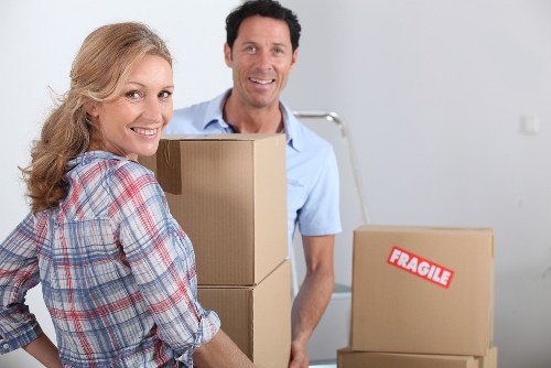 Moving boxes and furniture in a short-term storage space in Belmont